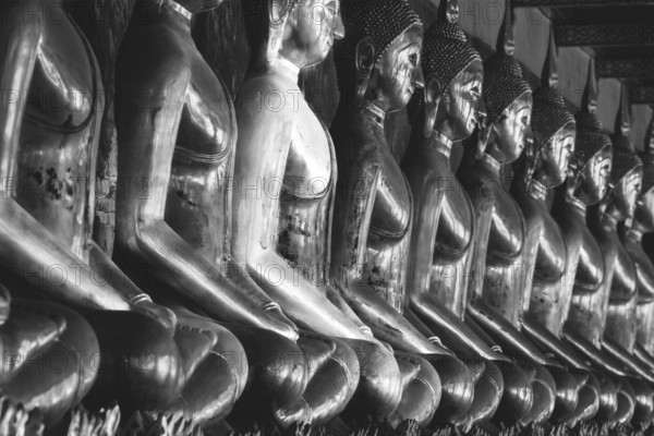 Gilded Buddha statues (Bhumispara mudra: Buddha Gautama at the moment of enlightenment), Wat Suthat Thepwararam, Royal Temple, Phra Nakhon, Bangkok, Thailand