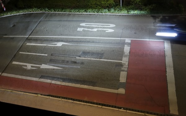 Nocturnal car traffic in a city, Germany