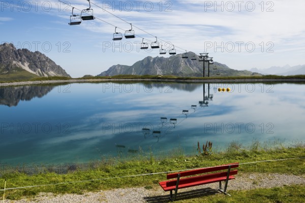 Mountain landscape with reservoir and chairlift, Saloberkopf, Warth, Bregenzerwald, Vorarlberg, Alps, Austria