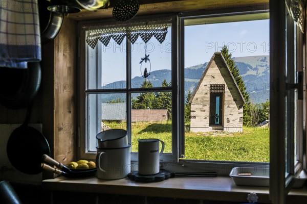 Ancient alpine hut and modern chapel, Alm Enge, Hirschau, Kanisfluh, Bregenzerwald, Vorarlberg, Alps, Austria