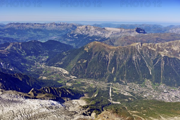 View from the Aiguille du Midi mountain station observation deck into the valley with the city, Chamonix-Mont-Blanc, Haute-Savoie, France