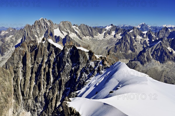 View from the Aiguille du Midi mountain station observation deck of the mountains Aiguille Vert, Les Droites, Les Courtes, Chamonix-Mont-Blanc, Haute-Savoie, France