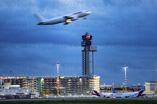 Airplane taking off from Düsseldorf Airport, Air Traffic Control Tower, North Rhine-Westphalia, Germany