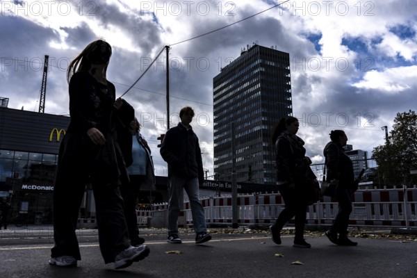 Passers-by in downtown Essen at the main train station, North Rhine-Westphalia, Germany