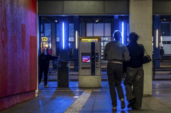Underpass at Essen Central Station, away from the platforms to the public transport buses below the tracks, dark even on bright days, North Rhine-Westphalia, Germany