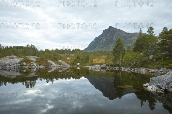 Magical morning on Steigtindvatnet in front of the majestic Litltind in Norway near Bodø