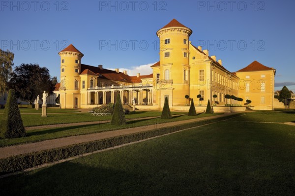 Rheinsberg Castle, front in late evening light, prime example of Friederician Rococo, Ruppiner Land, Brandenburg, Germany
