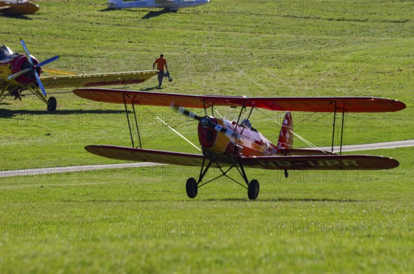 A Stampe-Vertongen SV-4A double-decker registered with HB-UPR during a flight demonstration as part of an air show on Rossfeld in Metzingen-Glems, Baden-Württemberg, Germany, for editorial use only