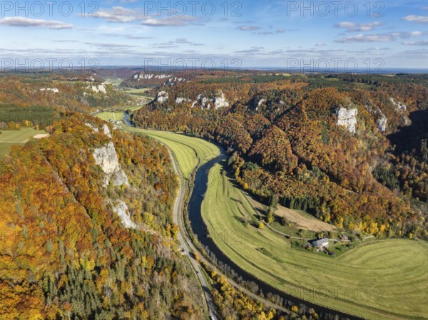 Aerial view of Upper Danube Valley surrounded by autumn vegetation, on the horizon Werenwag Castle, Sigmaringen district, Baden-Württemberg, Germany