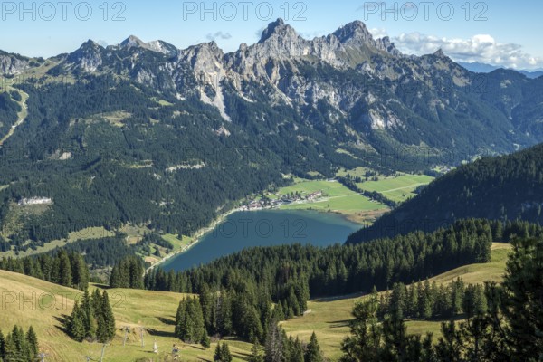 View from Neunerköpfle of Haldensee with Haller, Tannheimer Berge, Schartschrofen and Rote Flüh behind, Tannheimer Tal, Allgäu Alps, Tyrol, Austria