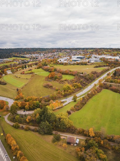 Winding roads through hilly, autumnal landscape with fields and forests, Dornstetten, Freudenstadt district, Germany