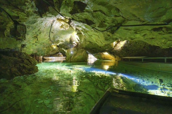 Impressive cave landscape with bluish-green water and mysterious atmosphere, Wimsener Höhle, Hayingen, Germany