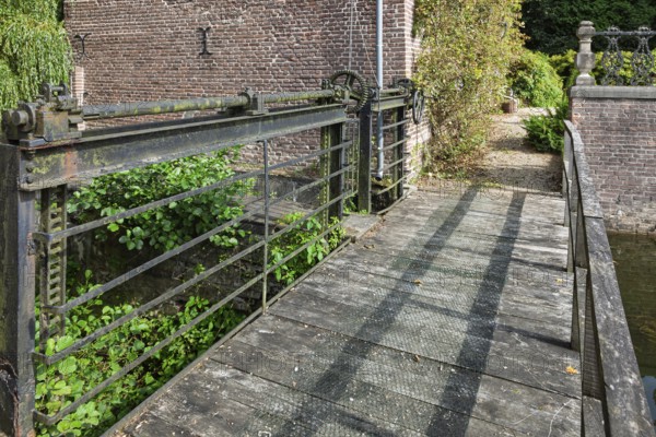 Old wooden bridge with a barrier, North Rhine-Westphalia, Germany