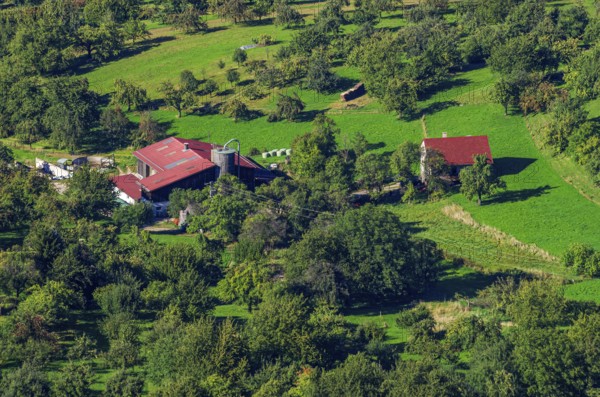 Picturesque rural area with farm at the foot of the Swabian Jura, Albtrauf auf dem Rossfeld in Metzingen-Glems, Baden-Württemberg, Germany
