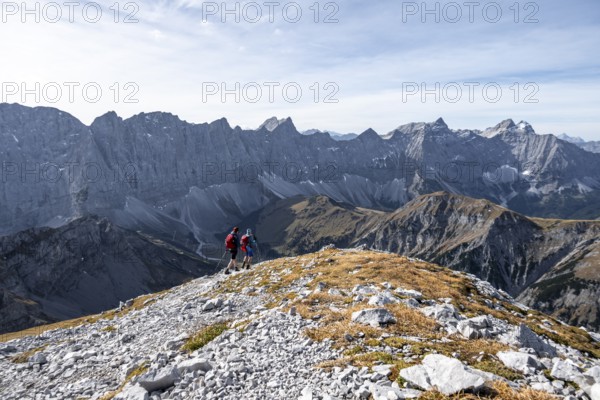 Two hikers on hiking trail, hiking to Gamsjoch, eastern Karwendel, Tyrol, Austria