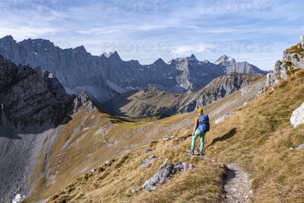 Female hiker on hiking trail, hiking to Gamsjoch, eastern Karwendel, Tyrol, Austria