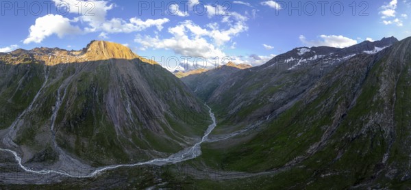 Steep Umbal Valley in the middle of the Austrian National Park Hohe Tauern, Steingrubenkopf and Bergtal at sunset, Alpine panorama, Hohe Tauern, East Tyrol, Austria