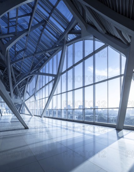 Modern architectural framework with glass and steel structure, glass facade with a greed of steel arrows, blue sky with a soft golden light of a sunrise, AI generated