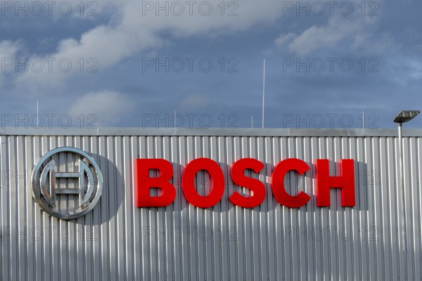 Bosch logo on a metal building façade under cloudy sky, Waiblingen, Baden-Württemberg, Germany