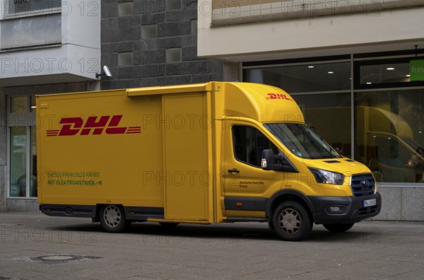 DHL delivery vehicle, e-car, electric drive, logo, delivery, parked in pedestrian zone, Stuttgart, Baden-Württemberg, Germany