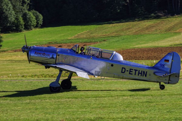 A Pilatus P-2 from Pilatus Flugzeugwerke AG with registration D-ETHN during a flight demonstration as part of an air show on Rossfeld in Metzingen-Glems, Baden-Württemberg, Germany, for editorial use only