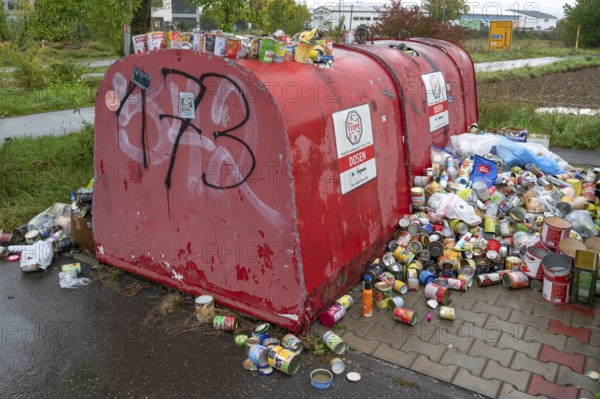 Overfilled can containers, Eckental, Middle Franconia, Bavaria, Germany