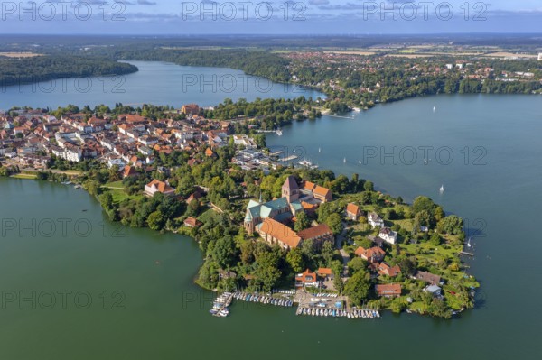 Aerial view over Ratzeburger Dom, late Brick Romanesque cathedral in the town Ratzeburg and the Ratzeburger See in summer, Schleswig-Holstein, Germany