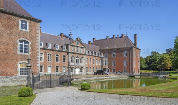 16th century Classicist Château de Franc-Waret in Louis XV style, moated castle in the village Fernelmont, province of Namur, Wallonia, Belgium