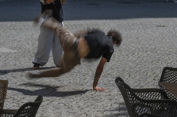 Breakdance by street artists on the market square, movement, Amberg, Upper Palatinate, Bavaria, Germany