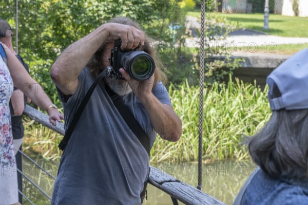 Photographer taking pictures, Amberg, Upper Palatinate, Bavaria, Germany