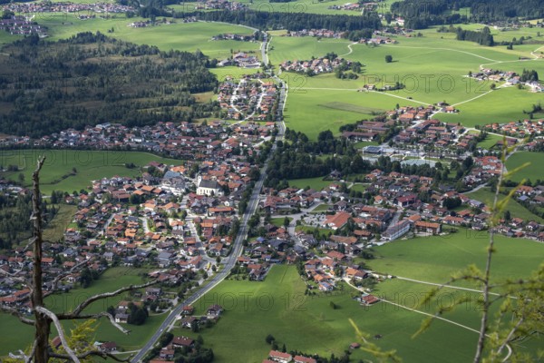 Deep view from Falkenstein of the alpine village of Inzell and the Inzeller moss, Bavaria, Germany