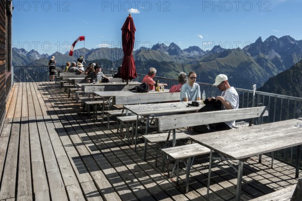 Terrace of the restaurant Gipfelstation Fellhornbahn, behind mountains of the Allgäu Alps, Oberstdorf, Oberallgäu, Allgäu, Bavaria, Germany