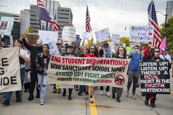 Detroit, Michigan USA - 18 October 2025 - A large crowd gathered for a 'No Kings' rally, protesting President Trump's actions against immigrants and against democratic institutions