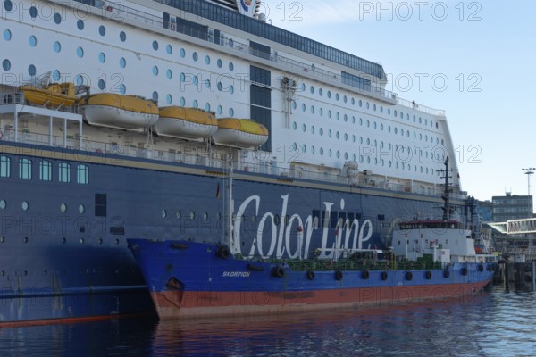 Kiel port, Kiel-Oslo ferry line, Color Line ferry and crusader being refueled, tanker for oil products Scorpion, side view, detail, lifeboats, portholes, cabin windows, Baltic Sea, Kiel Fjord, Schleswig-Holstein, Germany