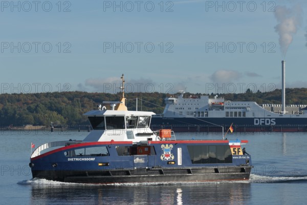 State capital Kiel, Kiel Fjord, liner, conveyor steamer, DFDS Regina Seways ferry to Klaipeda, chimney of the coastal power plant, Baltic Sea, Schleswig-Holstein, Germany