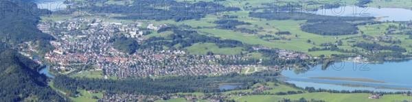 Panorama of Tegelberg, 1881m, on Füssen with historic old town, the Lech and behind it the Weissensee, on the right the Hopfensee and the Forggensee, Ostallgäu, Allgäu, Bavaria, Germany