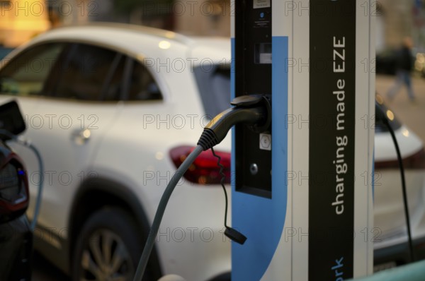 Parking lot with gas pump, EZE Network charging station, SICHARGE model for electric cars, charging station, e-mobility, e-car, pictogram, logo, Stuttgart, Baden-Württemberg, Germany