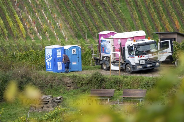 Emptying and cleaning mobile toilets Dixi toilets, Toi-Toi toilets in the vineyard in the Ahr Valley, next to a break area, near Mayschoß, Rhineland-Palatinate