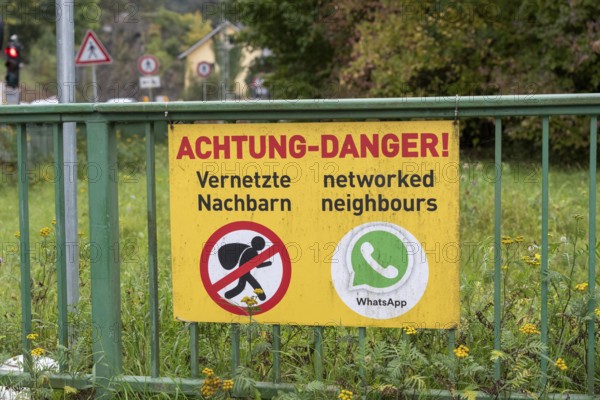 Information sign on neighborhood protection, residents have connected via WhatsApp to warn each other of possible burglars in the event of suspicious sightings of people or vehicles, near Altenahr, Rhineland-Palatinate