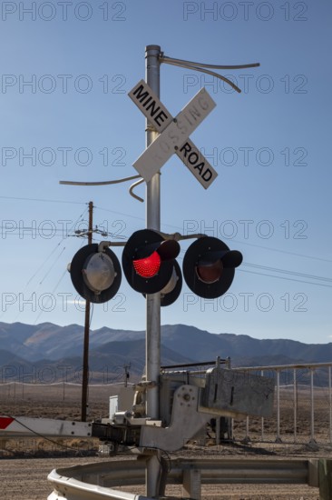 Round Mountain, Nevada - The Round Mountain Gold Mine, an open pit mine operated by Kinross Gold. The mine uses railroad-like crossing guards to block access at mine roads
