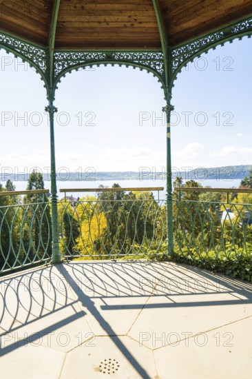 Metal pavilion with view of lake and forests under bright skies, Überlingen, Lake Constance, Germany