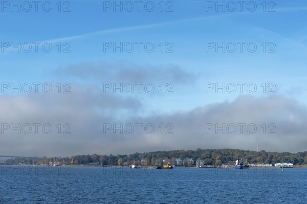 Kiel Fjord, Holtenau district, Kiel, Baltic Sea, tonnenhof of the Kiel Water Management Office, WSA, tugboat, Holtenau lighthouse, marina, hillside, forest, Schleswig-Holstein, Germany