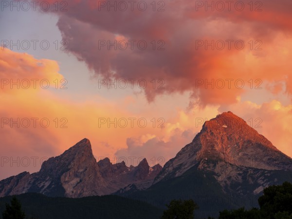 Watzmann under dramatic, red-lit clouds in the evening light, Berchtesgaden, Berchtesgadener Land, Upper Bavaria, Bavaria, Germany