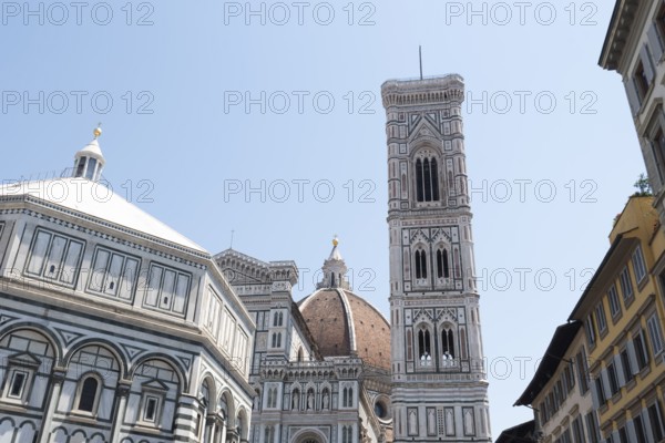 On the left Baptistery of San Giovanni, center dome of the Cathedral of Santa Maria del Fiore, on the right, Giotto's Campanile bell tower, Florence, Tuscany, Italy