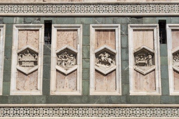 Detailed view of the reliefs on the Campanile di Giotto, the bell tower of the Cathedral of Santa Maria del Fiore, Florence, Tuscany, Italy