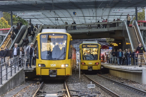 Wilhelmsplatz Bad Cannstatt stop, Stuttgarter Strassenbahnen AG, SSB. Platform with passengers. Stuttgart, Baden-Württemberg, Germany