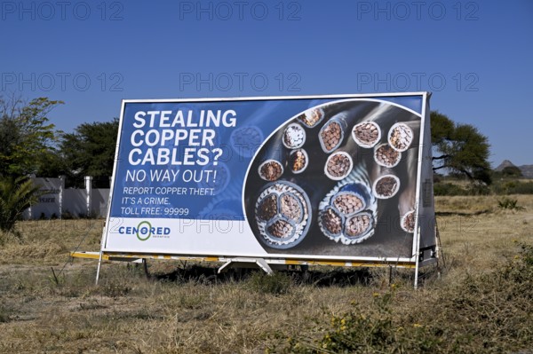 Warning sign for stealing copper cables, Otjiwarongo, Otjozondjupa region, Namibia