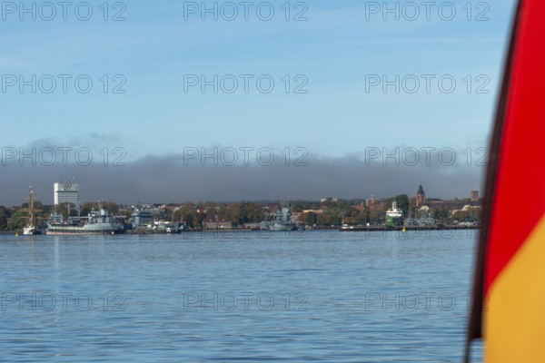 Kiel naval port, district of Wik, sailing school ship Gorch Fock in their home port, German Navy fuel transporter A1442 Spessart, supply ship A512, German flag, Olympic rings, tower of the Garrison Church of St. Peter's Church, Schleswig-Holstein, Germany