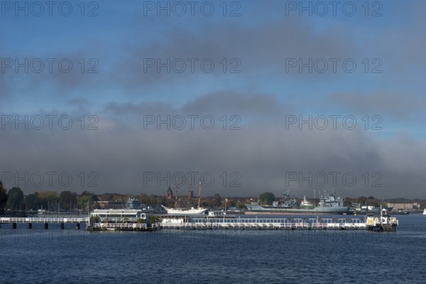 Kiel naval port, district of Wik, sailing school ship Gorch Fock in their home port, fuel transporter A1442 Spessart of the German Navy, tower of the garrison church Petrus-Kirche, Seebar Düsternbrook, Schleswig-Holstein, Germany