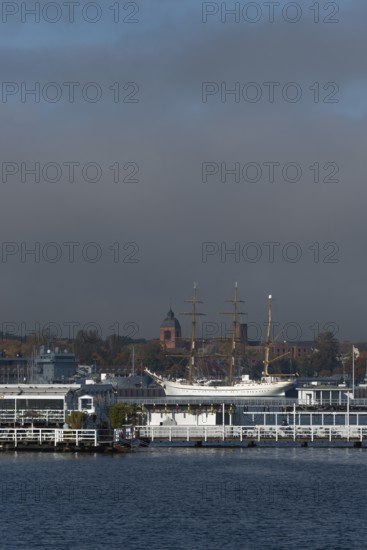 Kiel naval port, district of Wik, sailing school ship Gorch Fock in their home port, tower of the Petrus Church garrison church, Seebar Düsternbrook, Schleswig-Holstein, Germany